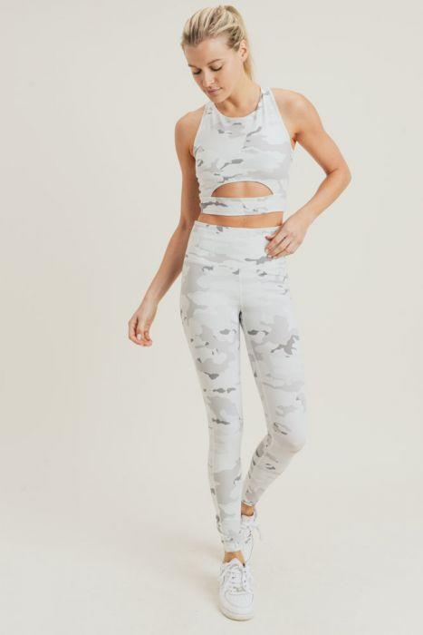 A pair of full-length Snow Camo Highwaist Leggings featuring a high waistband and discreet pouch, designed for comfort and style.