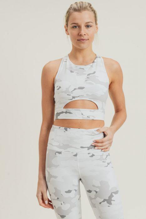 Snow camo sport crop top with peekaboo front, made of nylon and spandex, ideal for activewear.