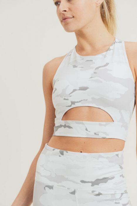 Snow camo sport crop top with peekaboo front, made of nylon and spandex, ideal for activewear.