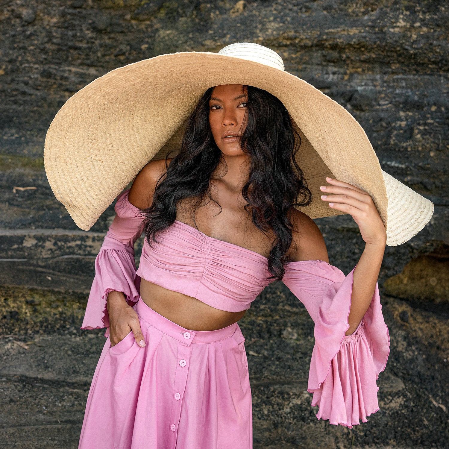 SOLANA Oversized Straw Hat in Natural Beige with a wide brim, showcasing its handmade craftsmanship and natural straw material.