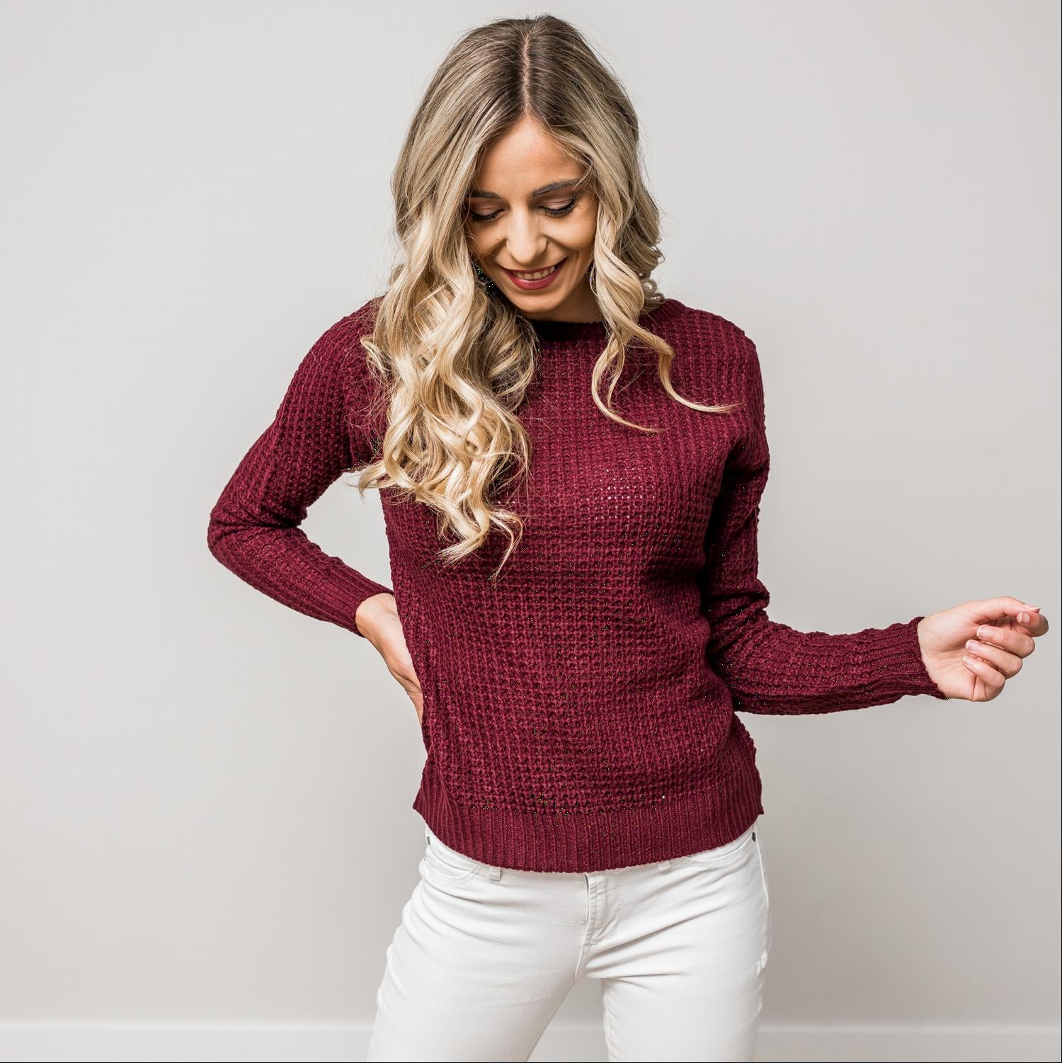 A stylish Solid Lace Up Back Knit Sweater Top featuring a criss-cross back design and elegant cut-out details, perfect for a chic look.