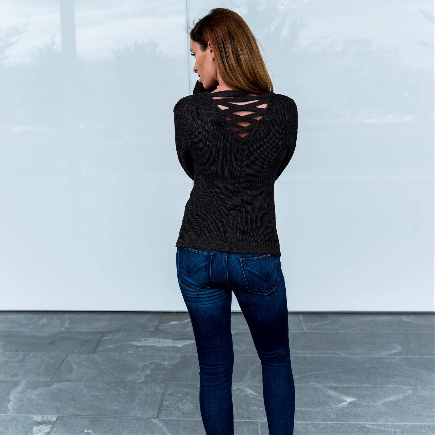 A stylish Solid Lace Up Back Knit Sweater Top featuring a criss-cross back design, perfect for casual and chic outfits.