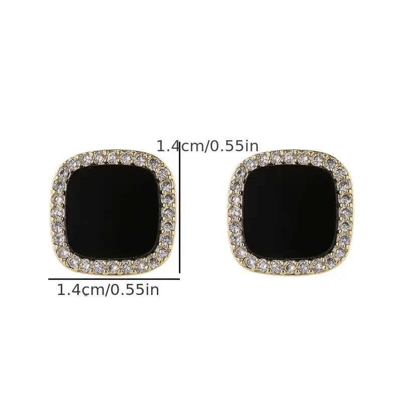 Luxury sparkling rhinestone square stud earrings showcasing their elegant design and shimmering rhinestones.