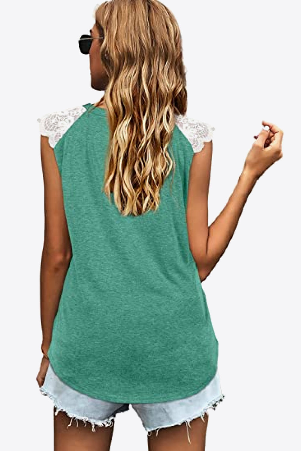 Spliced Lace Curved Hem Blouse featuring a V-neck and cap sleeves, showcasing a stylish design in a solid color.