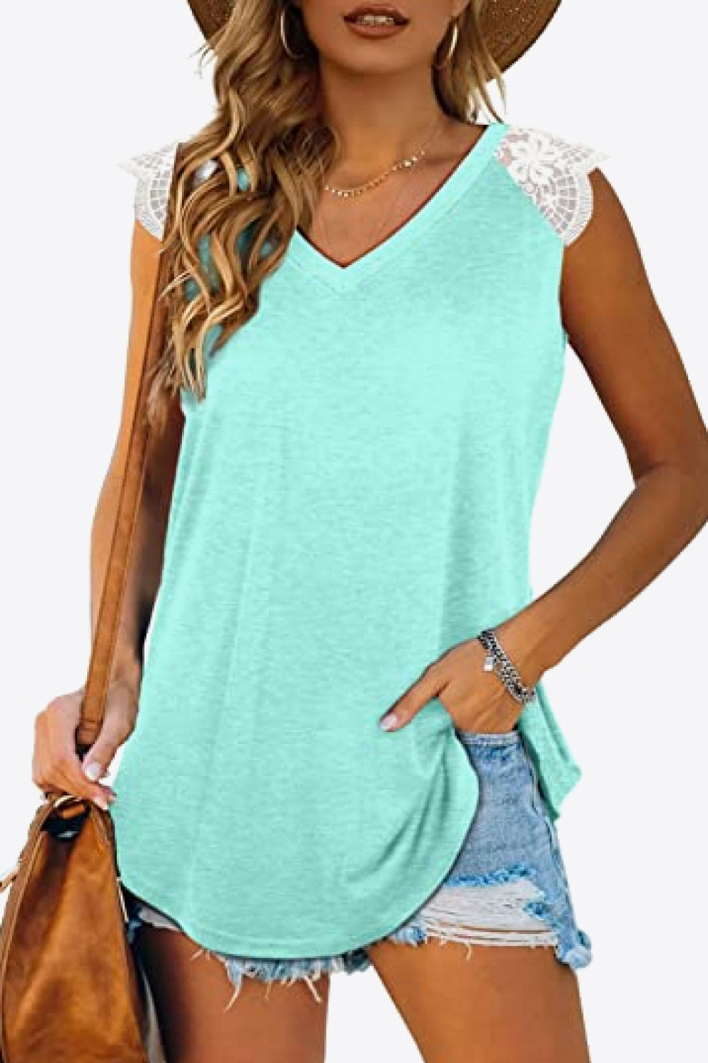 Spliced Lace Curved Hem Blouse featuring a V-neck and cap sleeves, showcasing a stylish design in a solid color.