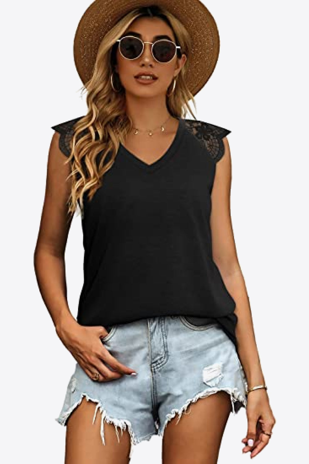 Spliced Lace Curved Hem Blouse featuring a V-neck and cap sleeves, showcasing a stylish design in a solid color.