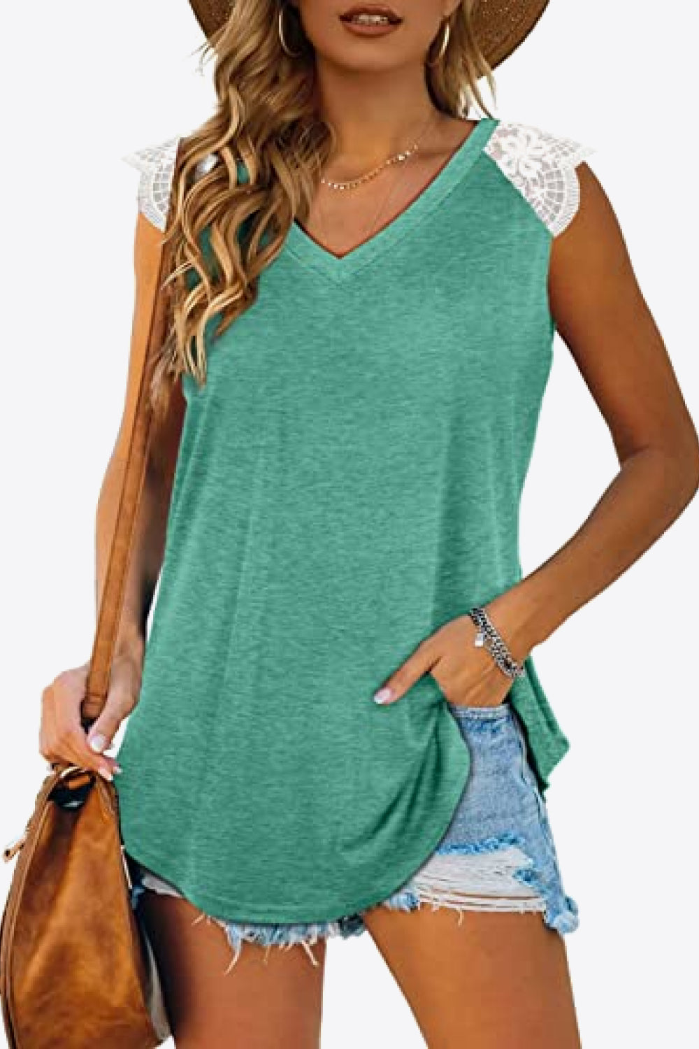 Spliced Lace Curved Hem Blouse featuring a V-neck and cap sleeves, showcasing a stylish design in a solid color.