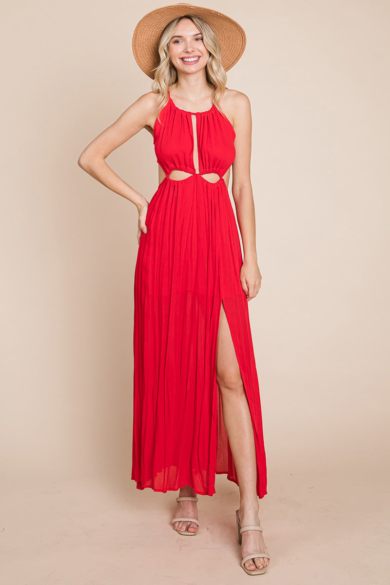 A stylish woman wearing a Split Front Cut Out Halter Maxi Dress, showcasing the elegant design and flattering silhouette.