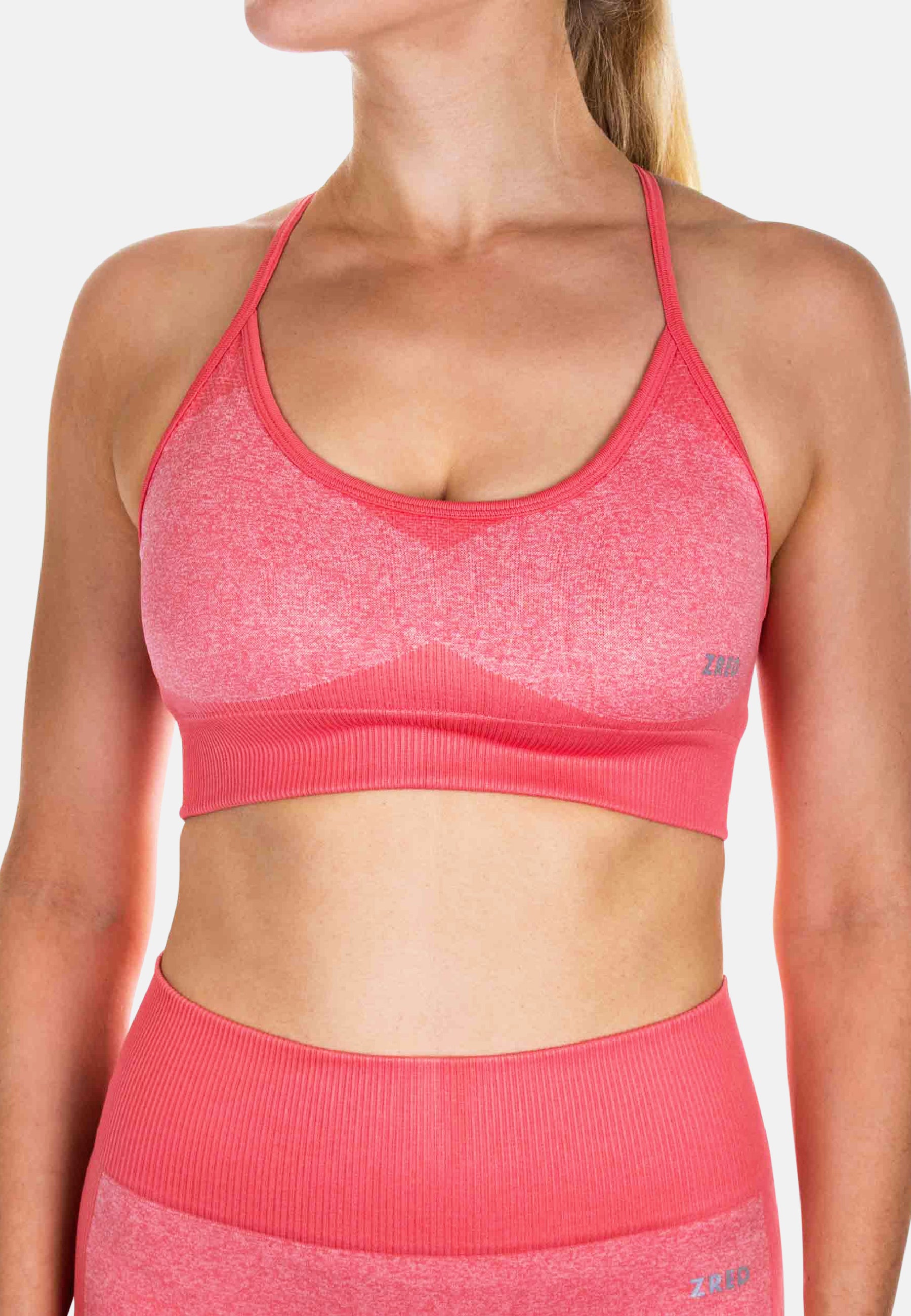 ZRED Sports Bra ICON in pink, showcasing its stylish design and comfortable fit, perfect for sports and leisure activities.