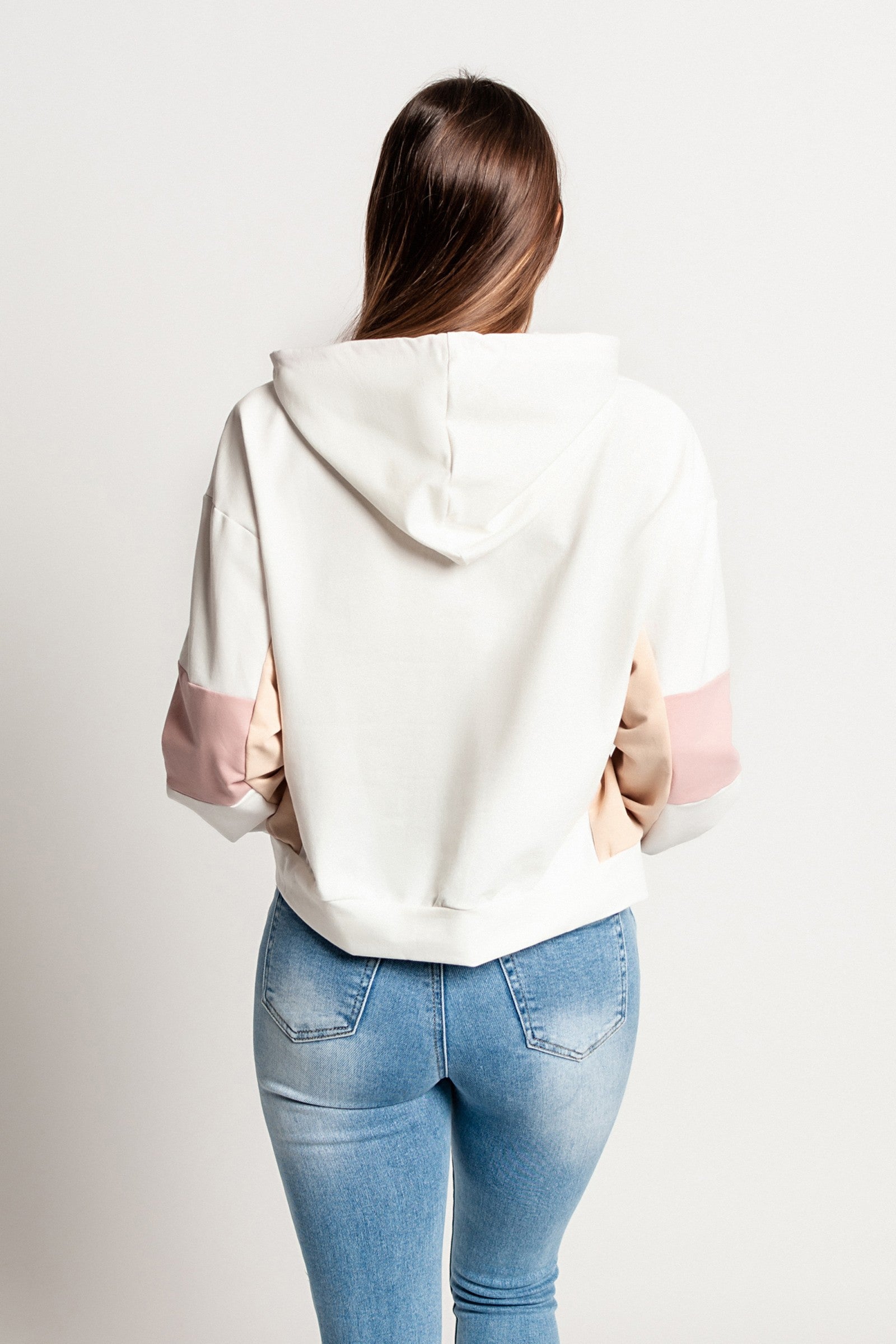 White Jappola sports sweatshirt featuring a drawstring hood and long sleeves with fitted wrists, made from a comfortable cotton-polyester-elastane blend.