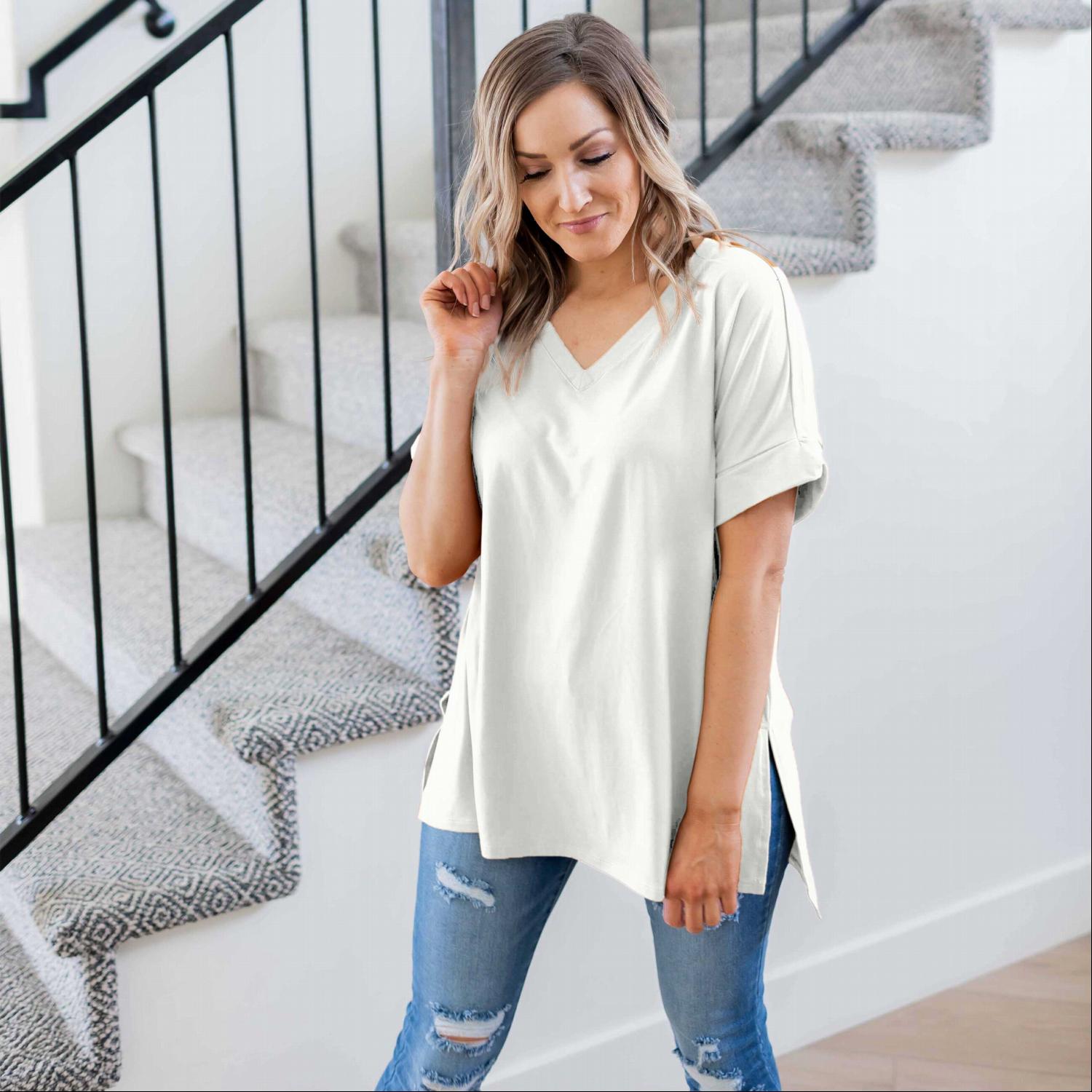 Sporty V-Neck Tee in various colors with slits at hips and hemmed sleeves, showcasing a relaxed fit and stylish design.