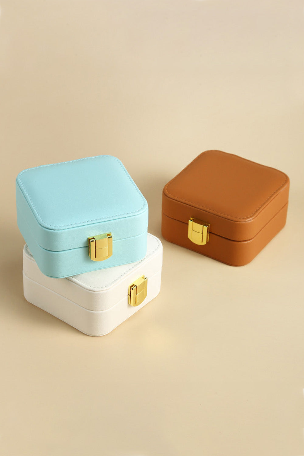 Square PU Leather Jewelry Box in elegant design, showcasing its compact size and luxurious PU leather material.