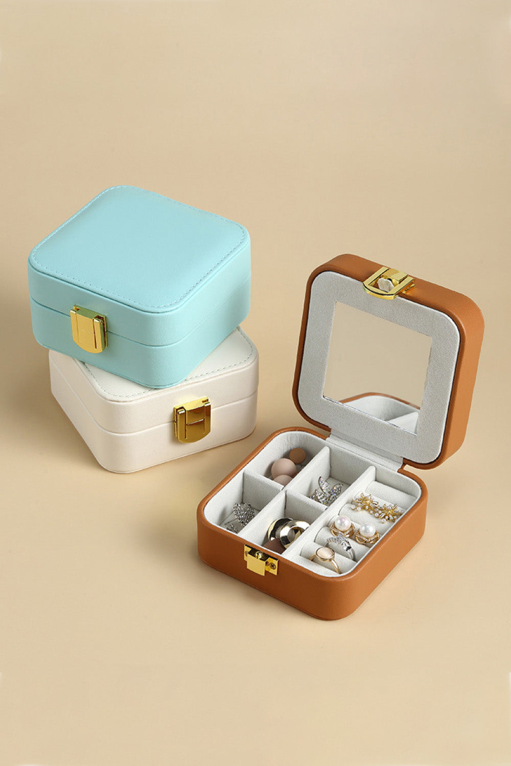 Square PU Leather Jewelry Box in elegant design, showcasing its compact size and luxurious PU leather material.