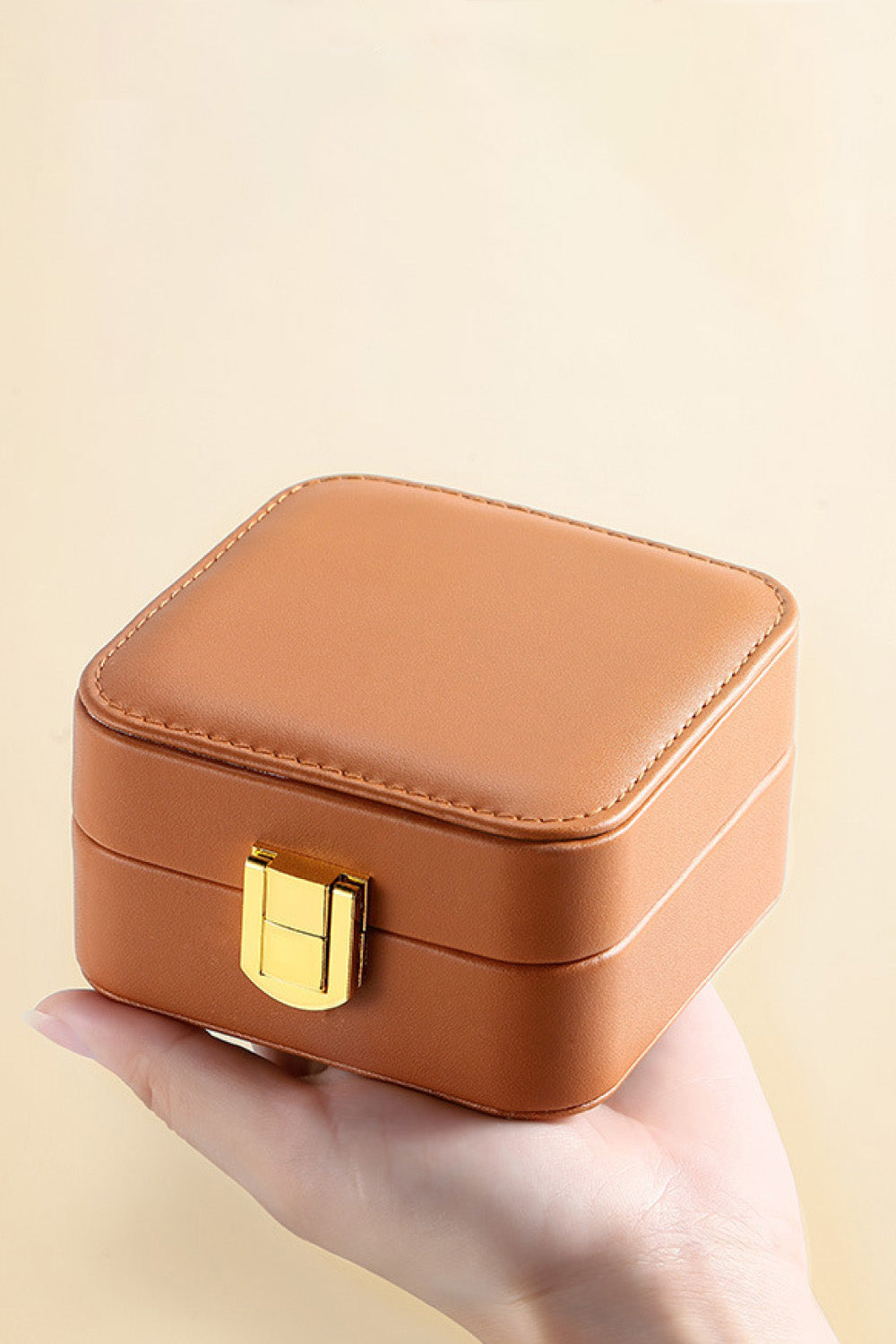 Square PU Leather Jewelry Box in elegant design, showcasing its compact size and luxurious PU leather material.