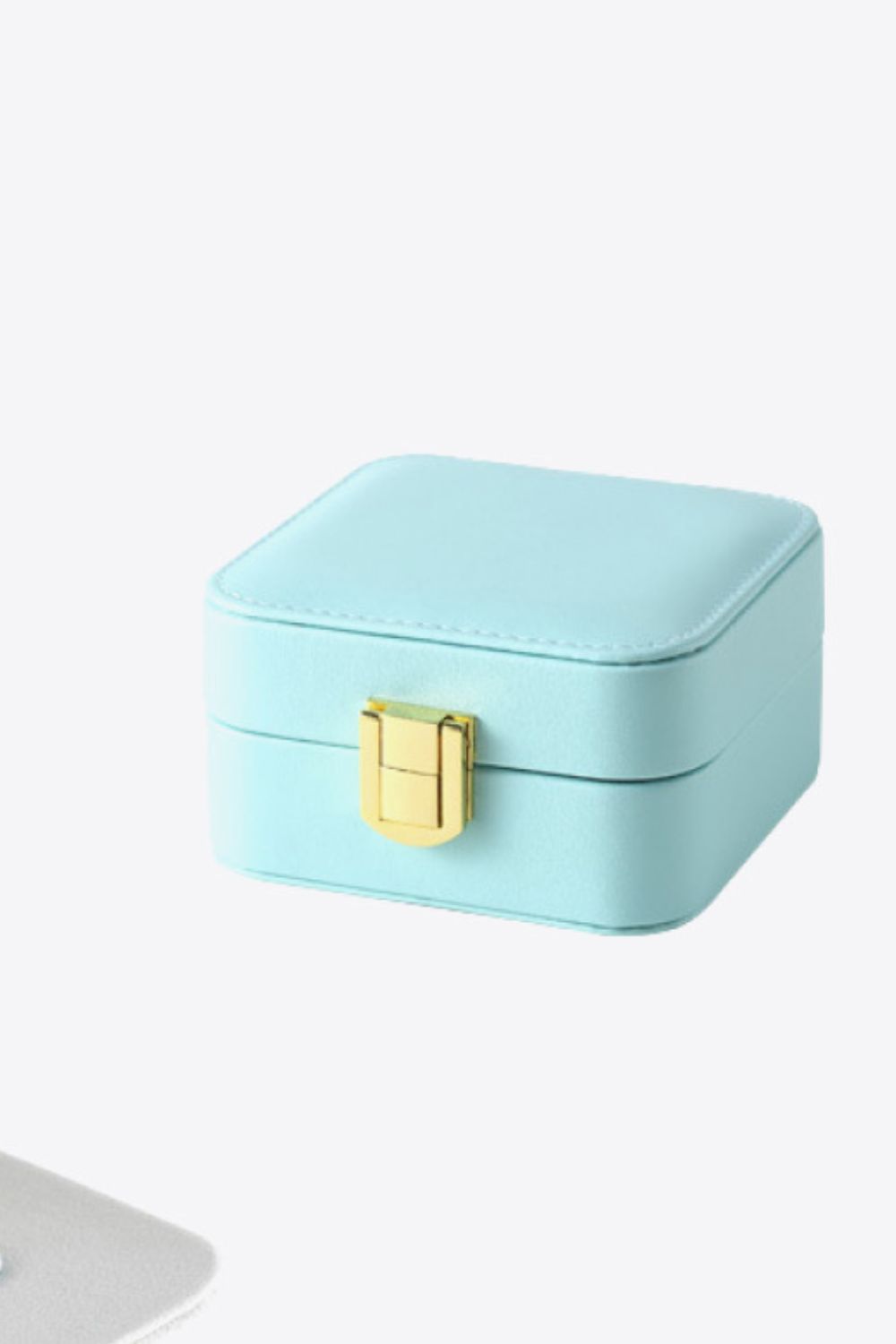 Square PU Leather Jewelry Box in elegant design, showcasing its compact size and luxurious PU leather material.