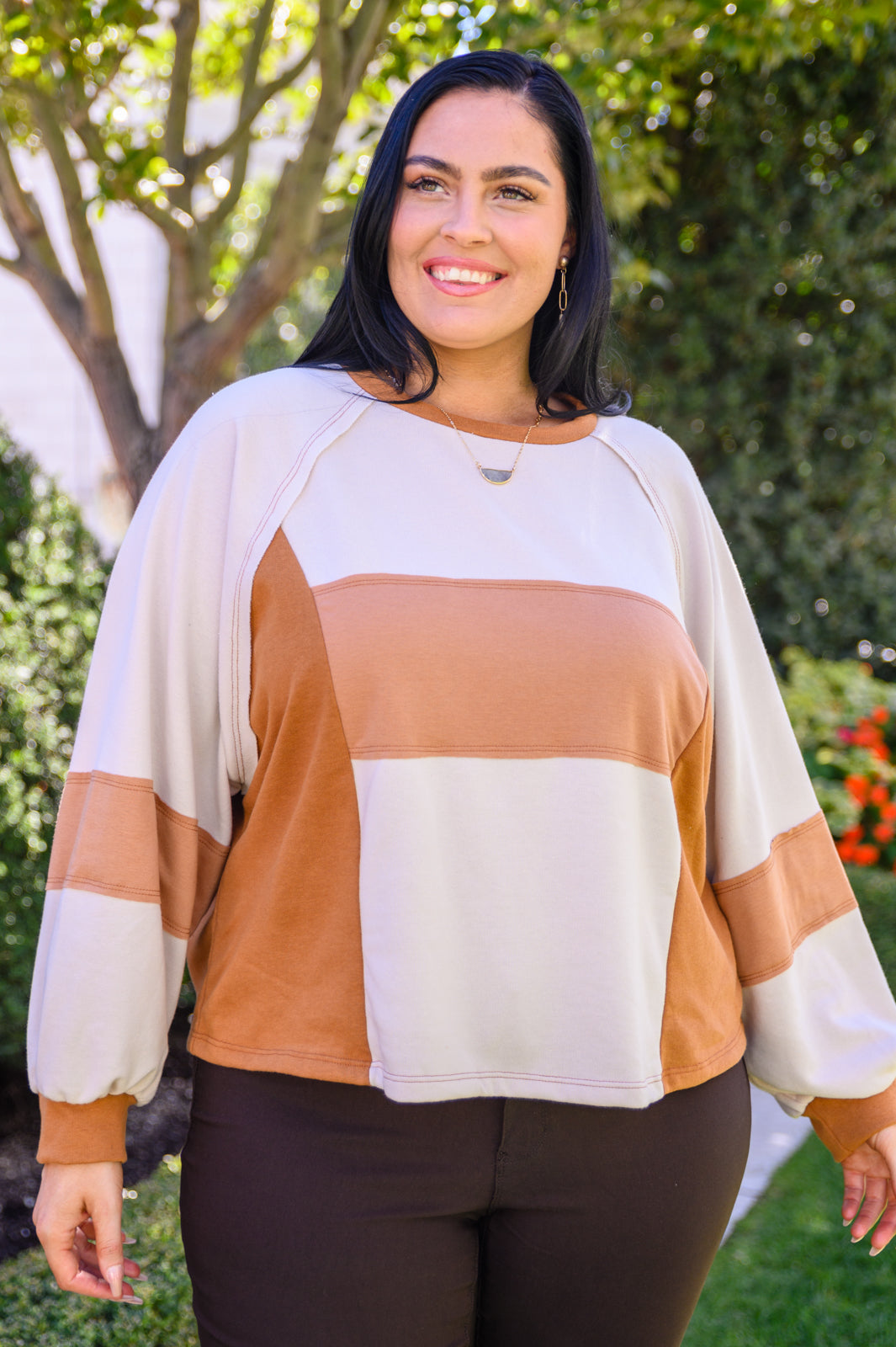 Status Quo Boxy Long Sleeve Top featuring a round neckline, balloon sleeves, and color block detail in a lightweight French terry knit fabric.