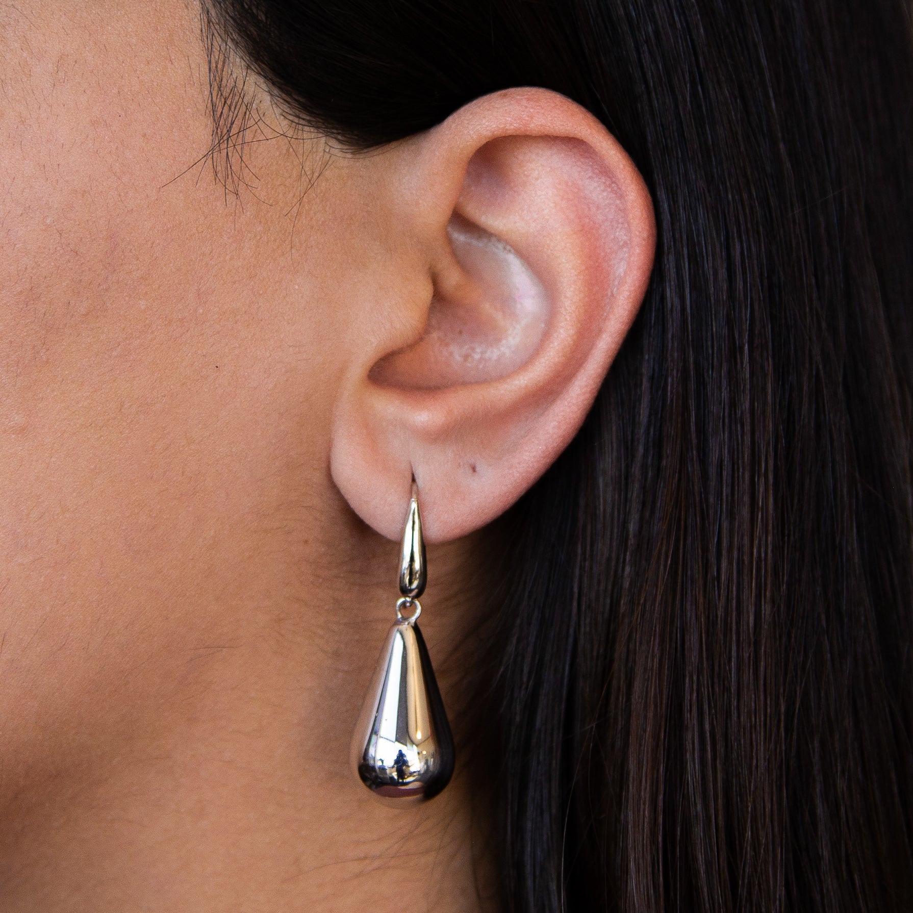 Elegant sterling silver earrings in raindrop design, handcrafted in Italy.