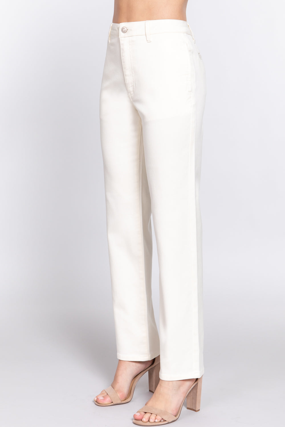 A pair of beige straight fit twill long pants made from cotton, polyester, and spandex, showcasing a stylish and comfortable design.