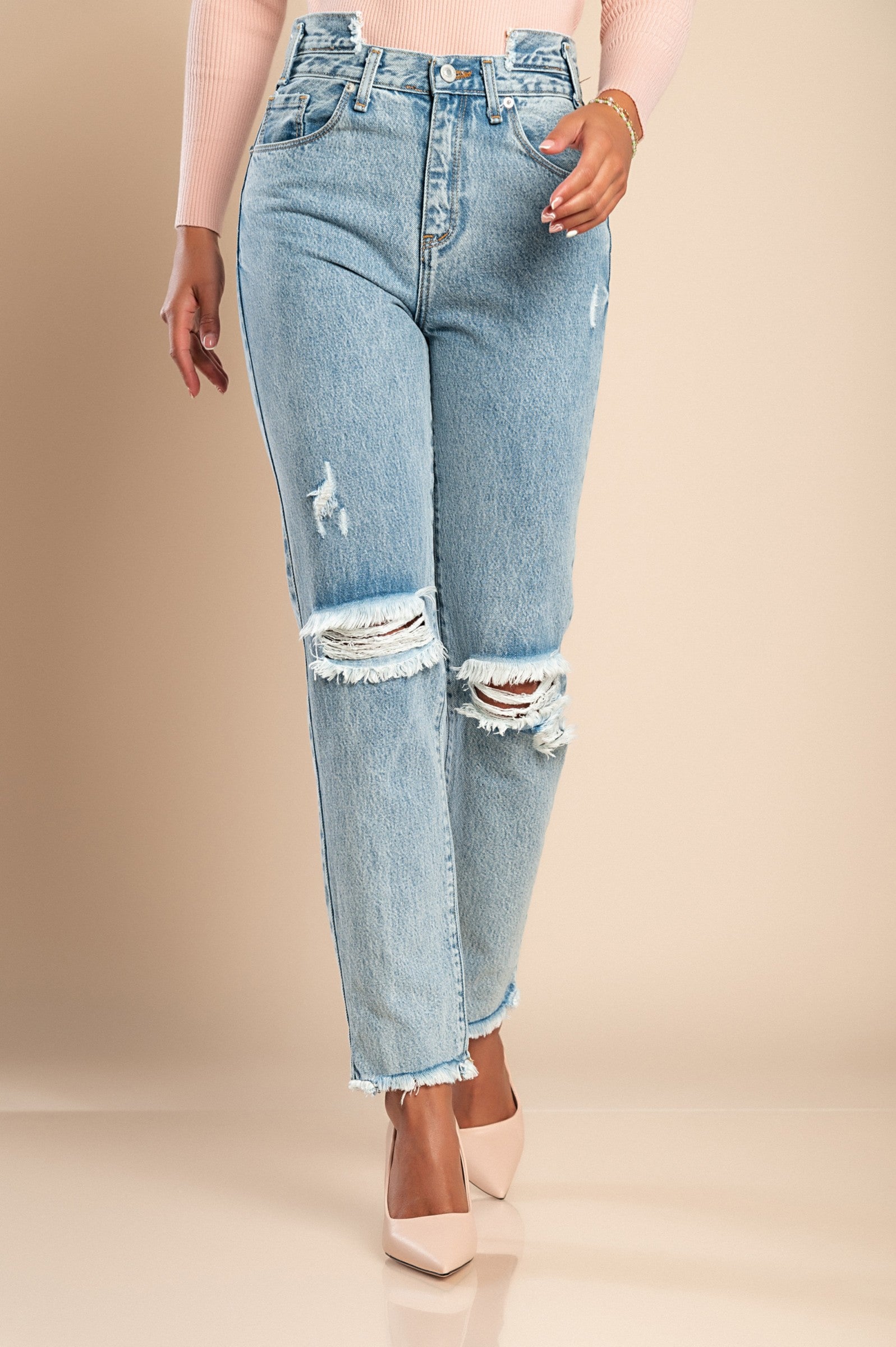 Light blue straight jeans made from high-quality cotton, featuring a high waist, zip and button closure, and front and back pockets.