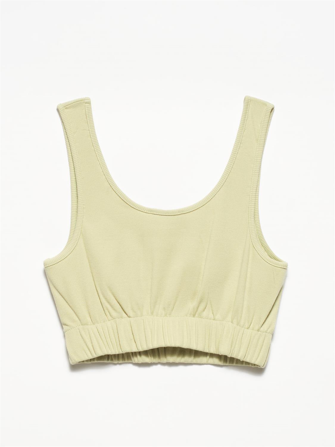 A stylish strappy top made from 96% cotton and 4% elastane, featuring thin straps and a comfortable fit.