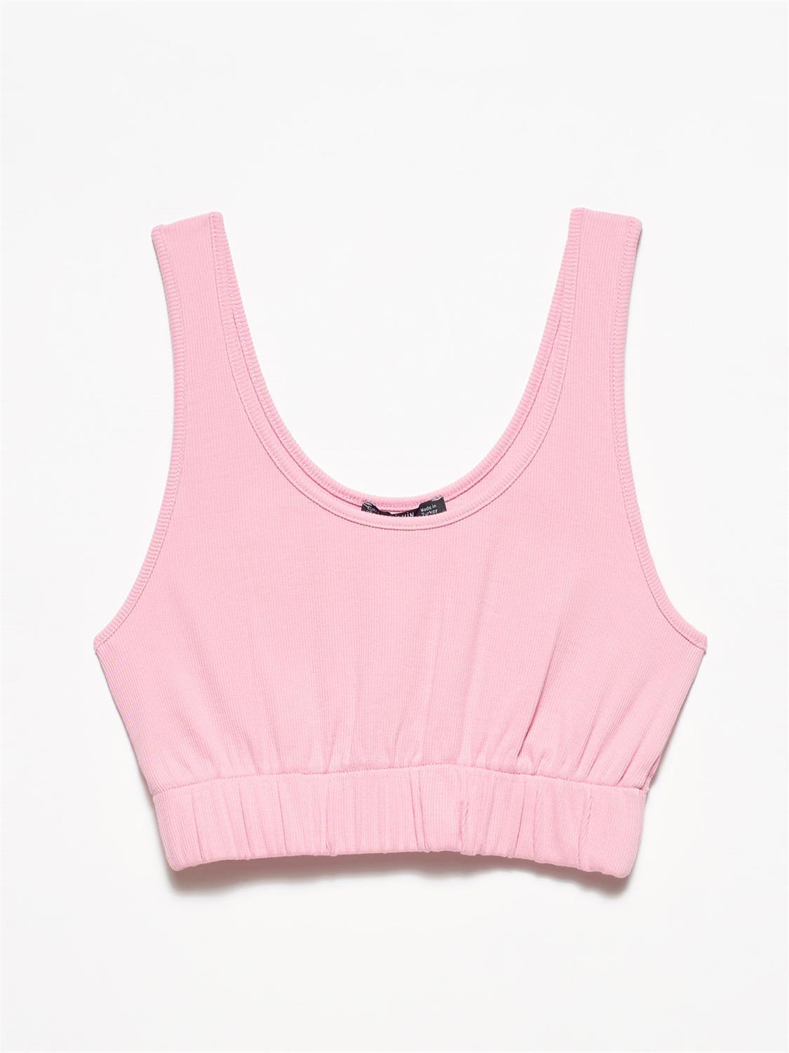 A stylish strappy top made from 96% cotton and 4% elastane, featuring thin straps and a comfortable fit.