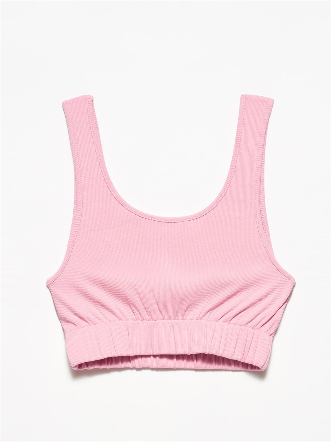 A stylish strappy top made from 96% cotton and 4% elastane, featuring thin straps and a comfortable fit.