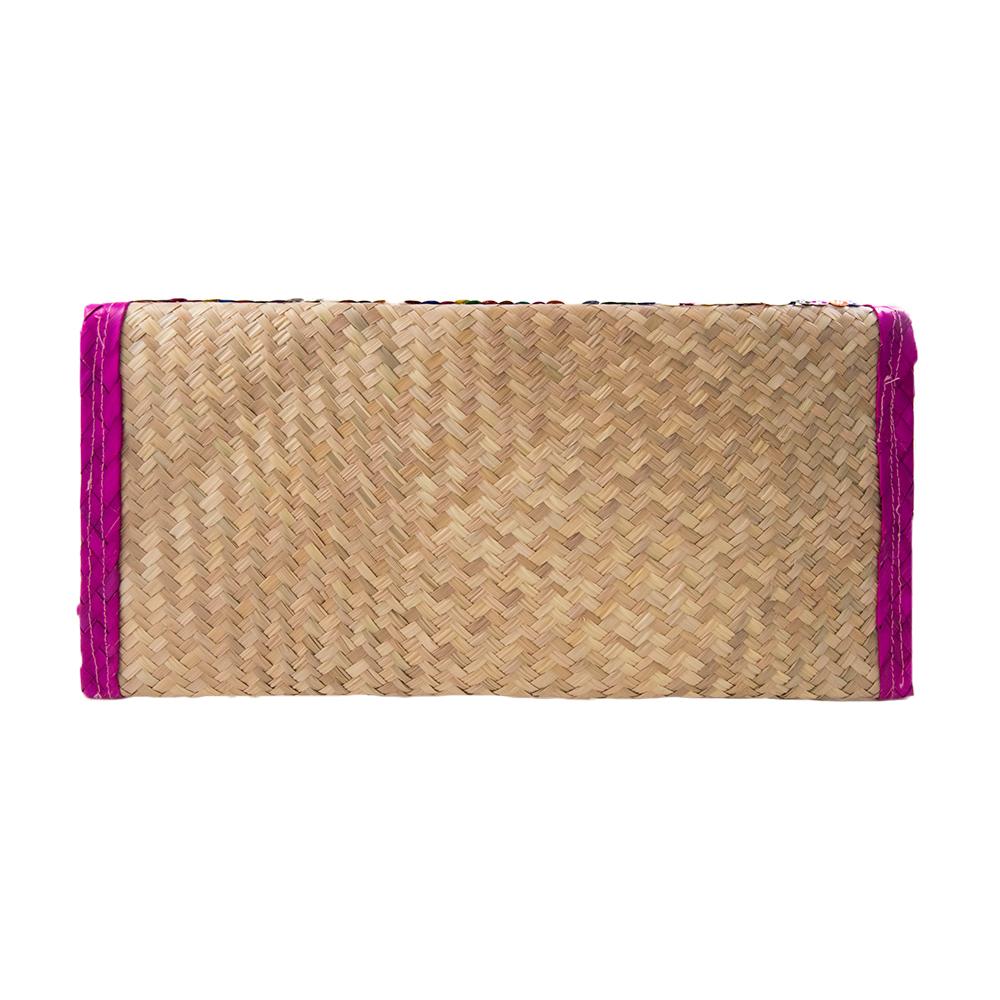 Handcrafted Straw Clutch Bag featuring vibrant sequin stripes and pink trim, made from natural palm leaves.