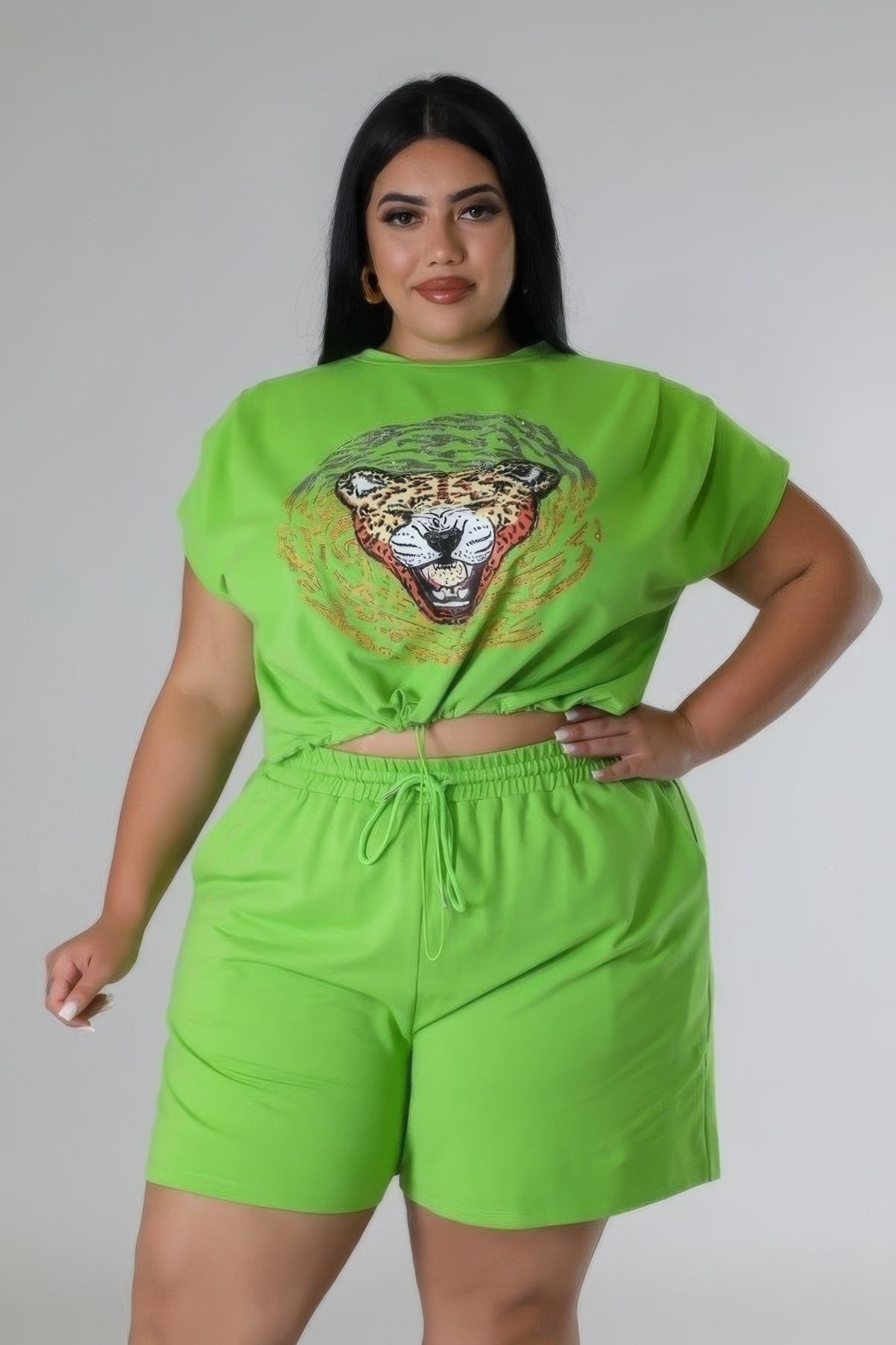 1XL.2XL.3XL Stretch Short Set in green featuring rhinestone graphic design and high-waisted shorts with pockets.