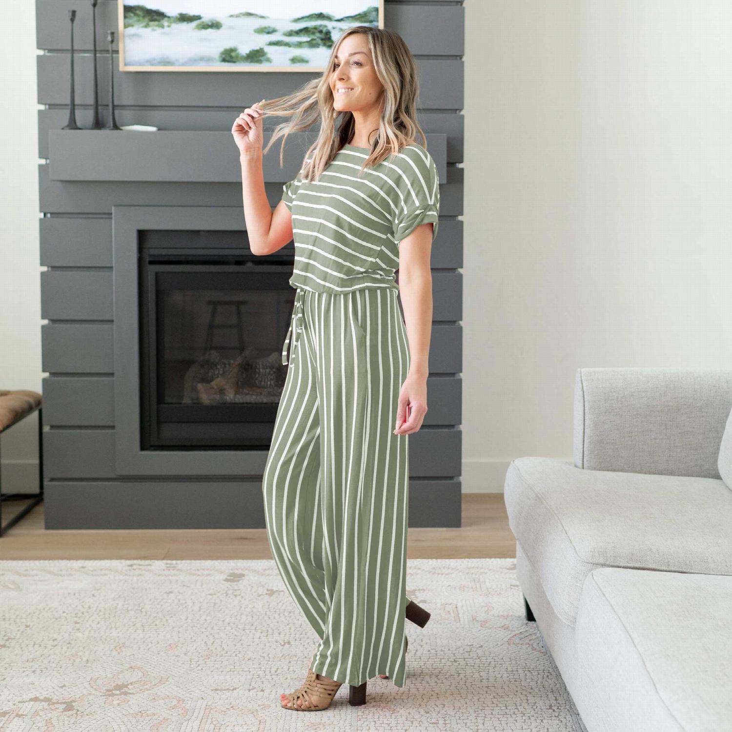 A stylish Stripe Jumpsuit featuring an elastic waist and back keyhole detail, perfect for casual outings and lounging.