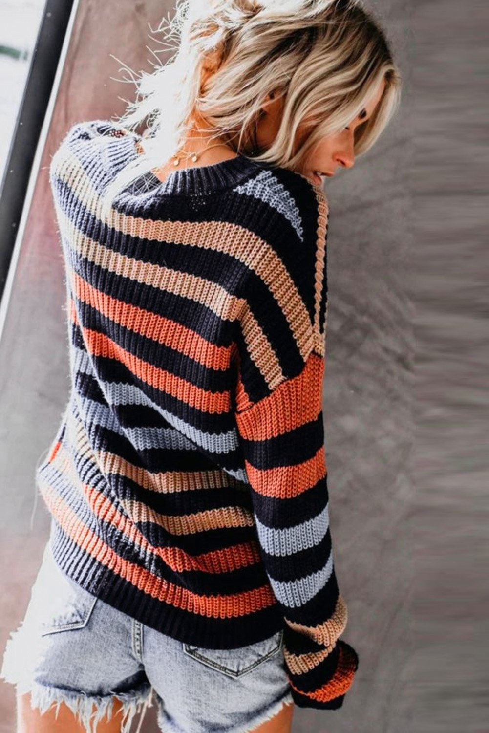 A stylish multicolor striped drop shoulder sweater, perfect for winter wear, featuring long sleeves and a relaxed fit.