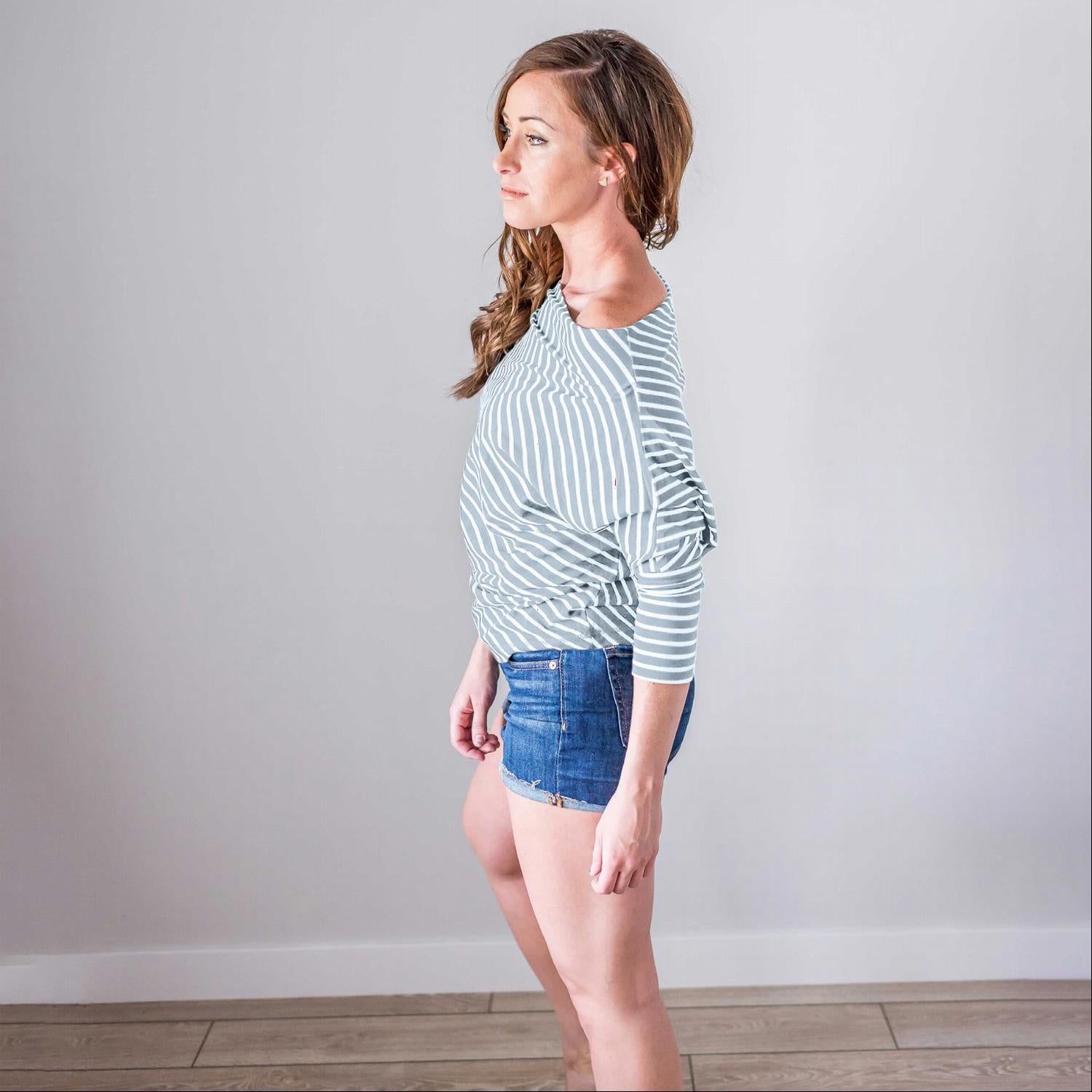 A stylish striped longsleeve off shoulder top featuring a boat neck design, long sleeves, and a comfortable fit, perfect for warm weather.