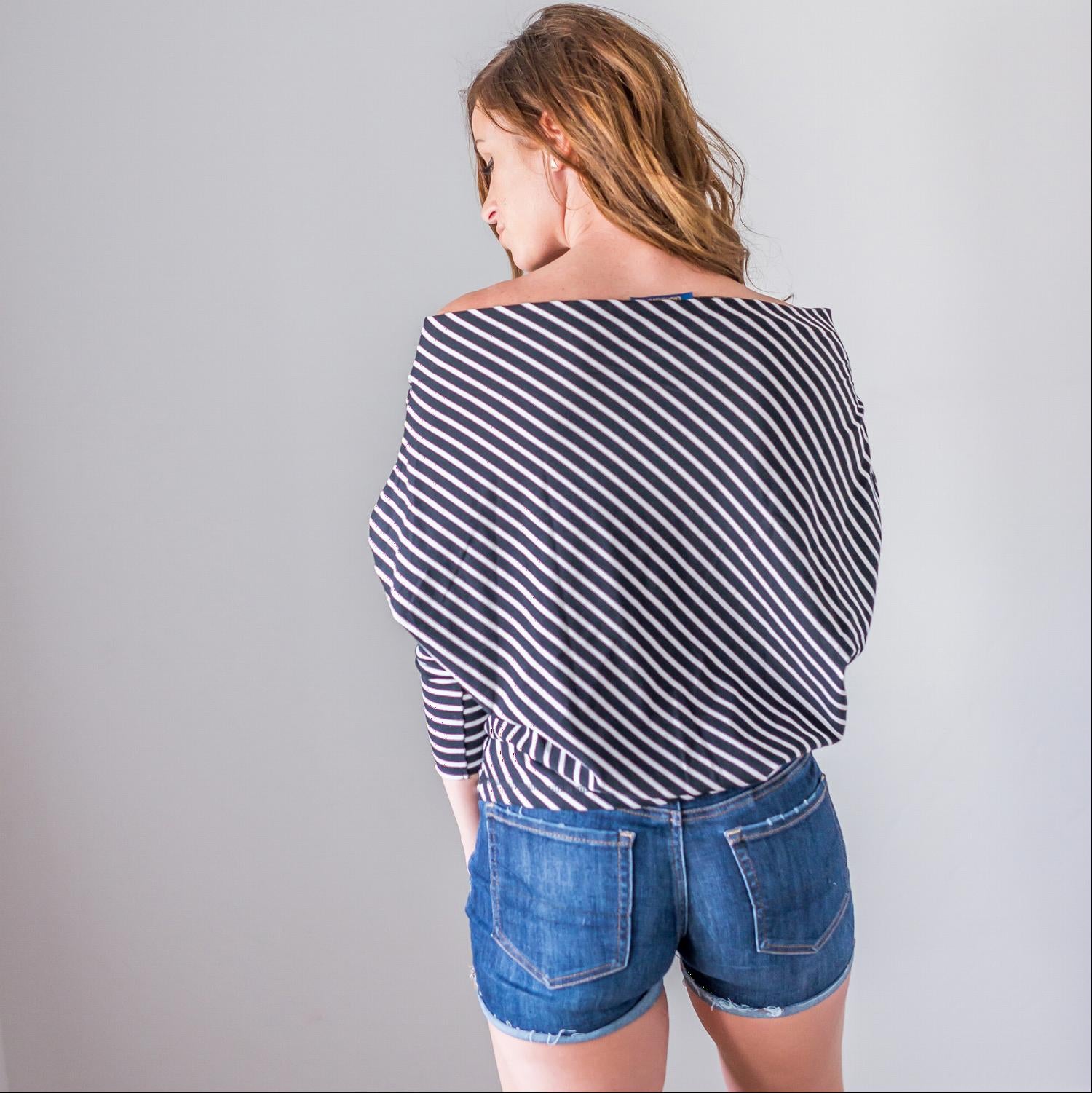 A stylish striped longsleeve off shoulder top featuring a boat neck design, long sleeves, and a comfortable fit, perfect for warm weather.