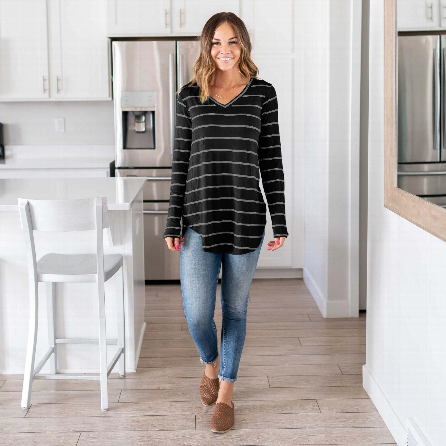 Striped V-neck Dolphin Hem Top featuring long sleeves and a relaxed fit, perfect for casual wear.