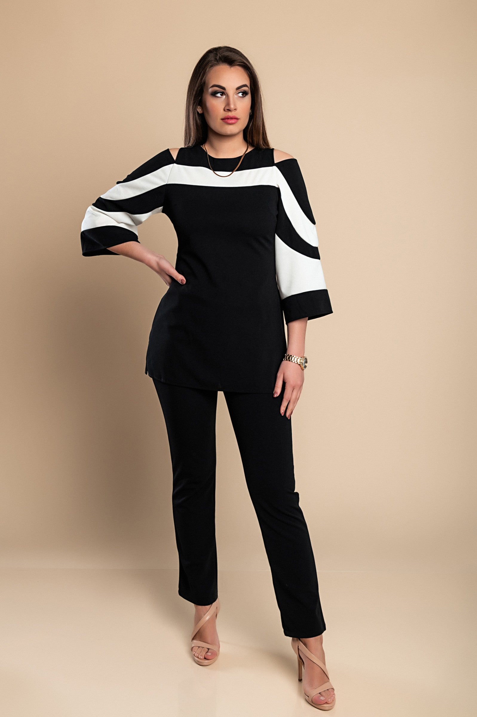 Stylish black top and pants set featuring a round neckline, off-the-shoulder design, and 3/4 bell sleeves, made from soft fabric.