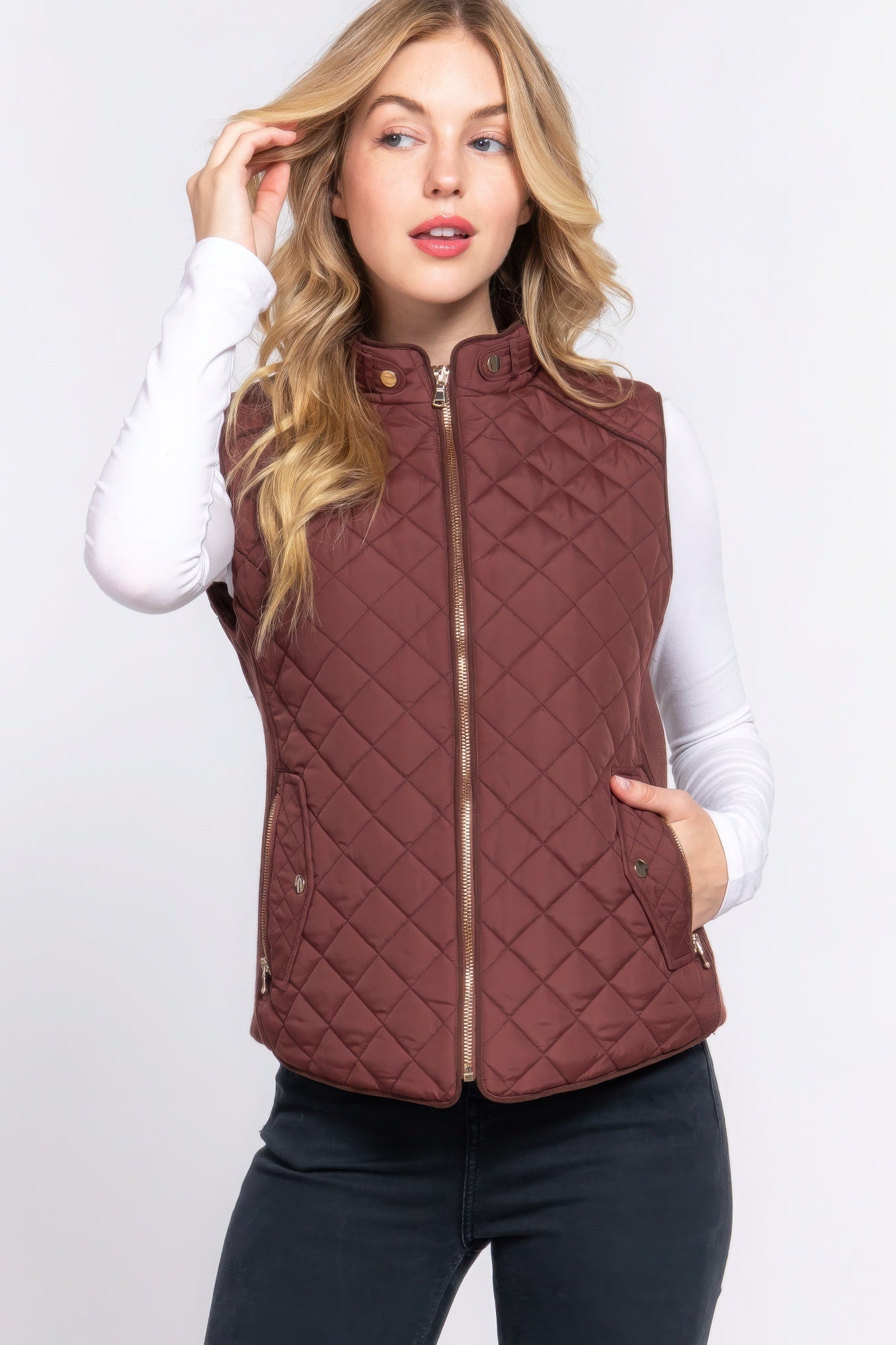 A stylish Suede Piping Quilted Padding Vest in Pale Taupe color, featuring suede piping details and front pockets, perfect for layering.