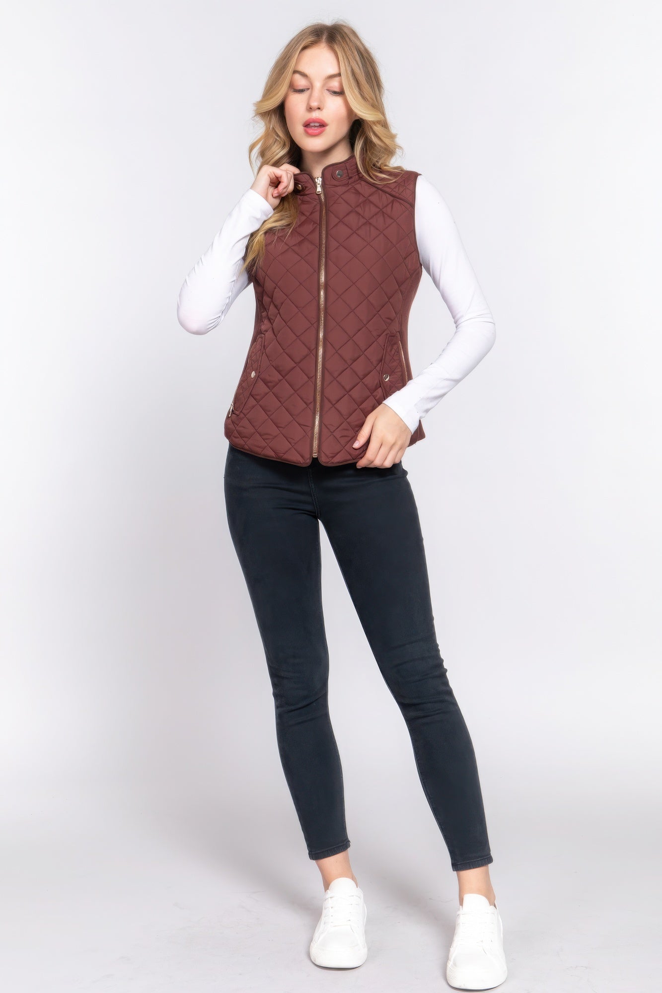 A stylish Suede Piping Quilted Padding Vest in Pale Taupe color, featuring suede piping details and front pockets, perfect for layering.