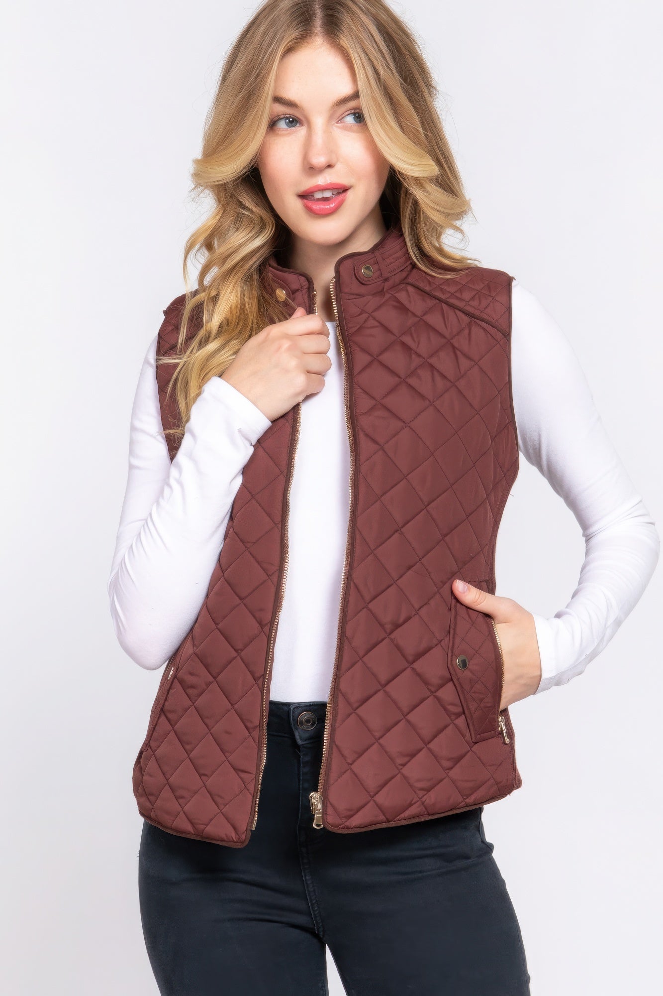 A stylish Suede Piping Quilted Padding Vest in Pale Taupe color, featuring suede piping details and front pockets, perfect for layering.