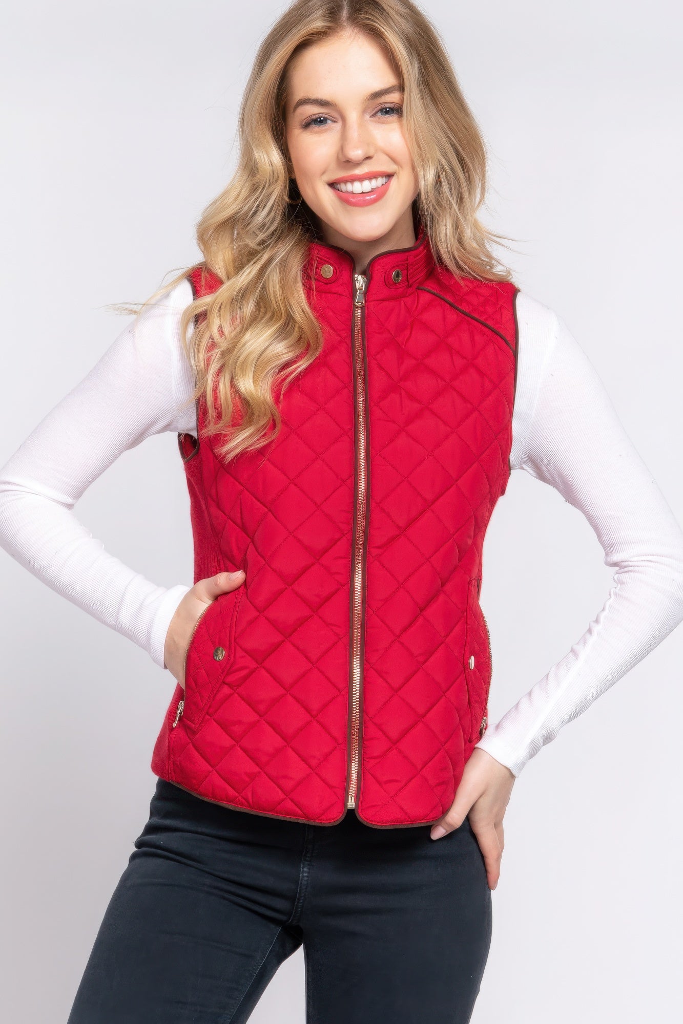 A stylish Suede Piping Quilted Padding Vest in Pale Taupe color, featuring suede piping details and front pockets, perfect for layering.