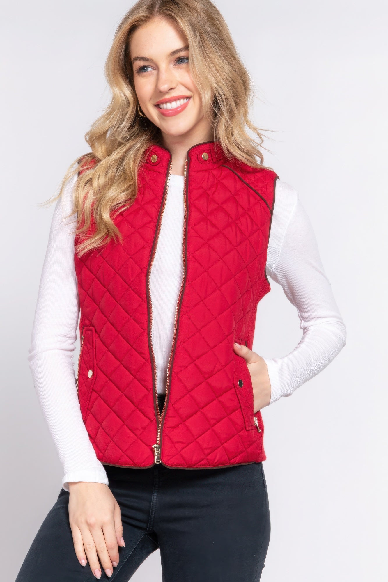 A stylish Suede Piping Quilted Padding Vest in Pale Taupe color, featuring suede piping details and front pockets, perfect for layering.