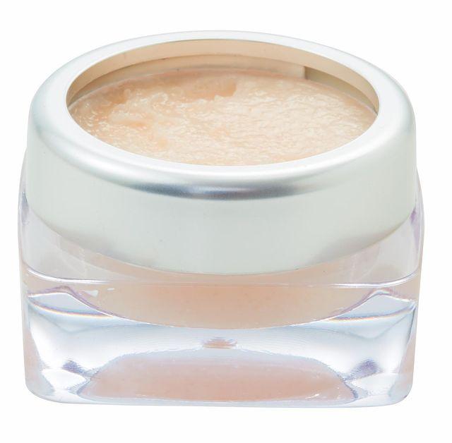 A jar of Sugar Lip Scrub with a smooth texture, surrounded by natural ingredients like sugar and oils, showcasing its exfoliating properties.