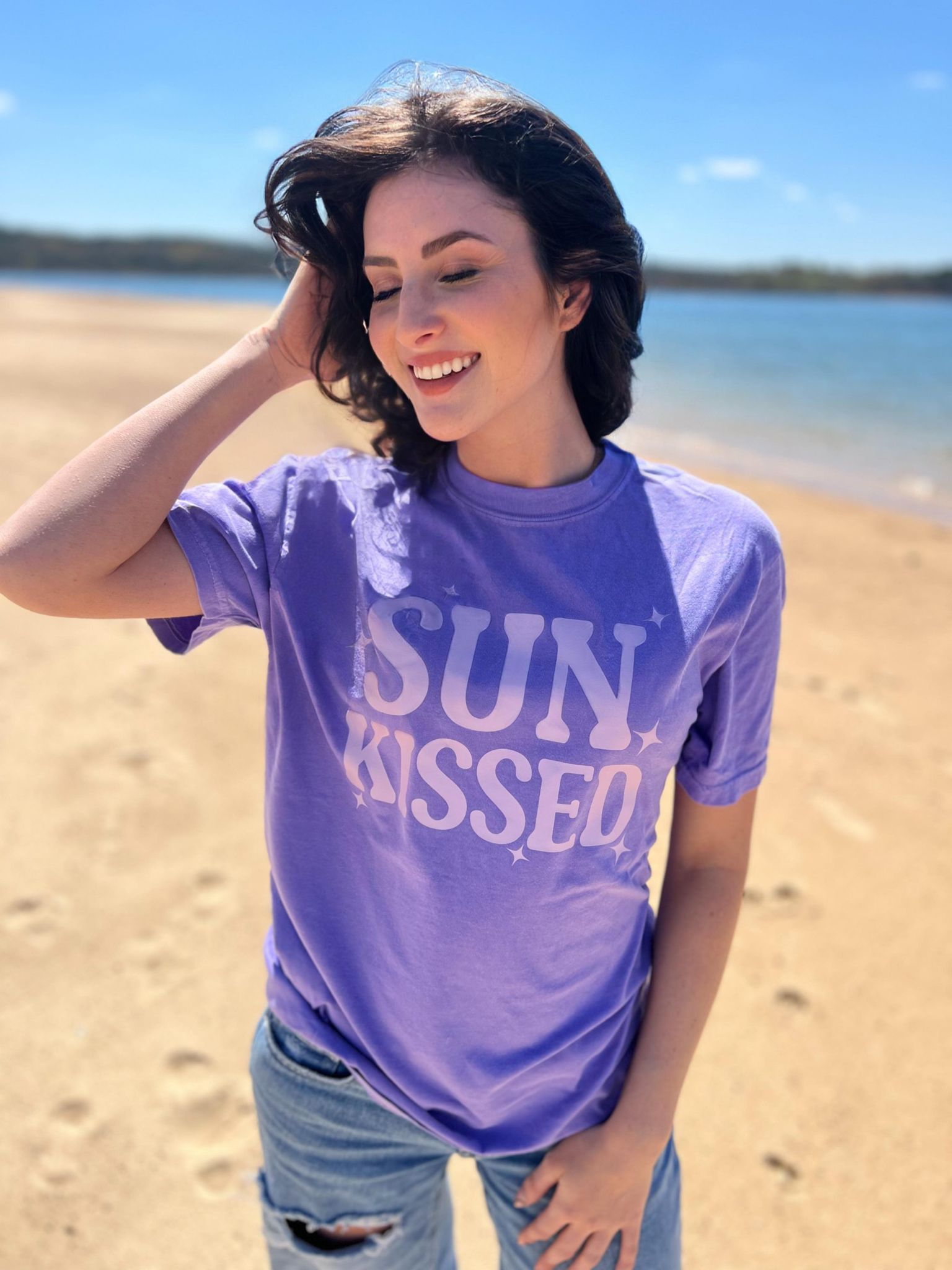 A vibrant violet Sunkissed Purple Tee displayed on a mannequin, showcasing its comfortable fit and stylish design.