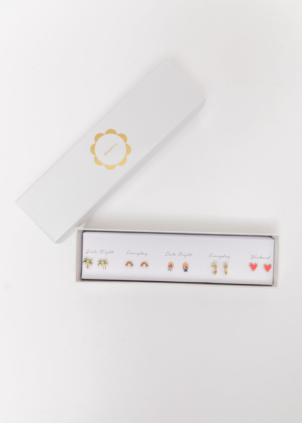 Five pairs of gold earrings in a stylish box, designed for various occasions.