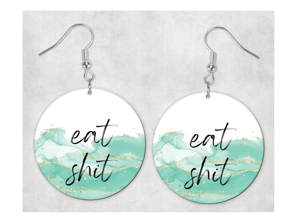 A pair of 1-inch circle earrings featuring the phrase 'Eat Shit' on a stylish hook ear wire, perfect for bold fashion statements.