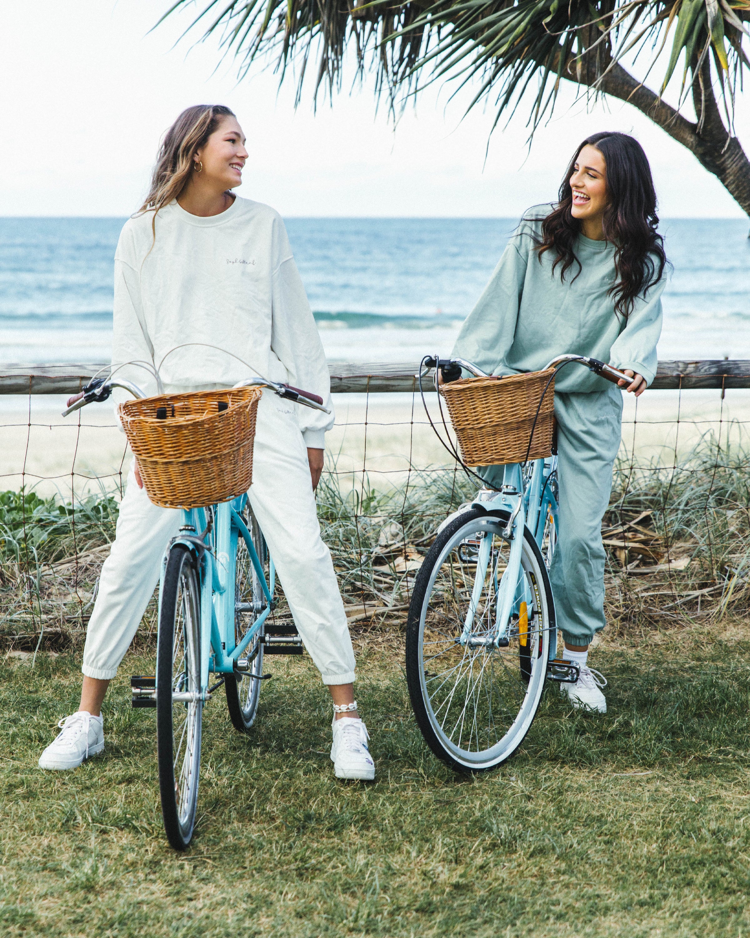 A pair of sage green sweatpants made from soft cotton and polyester blend, featuring an elastic waistband for comfort.