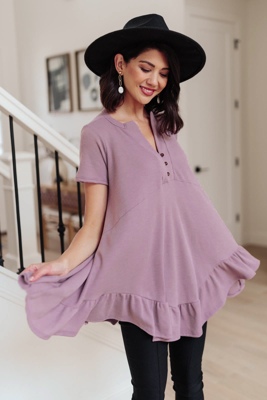 Lavender Sweet Breeze Tunic Dress featuring a button-up v neckline and ruffled hem, made from soft waffle knit fabric.