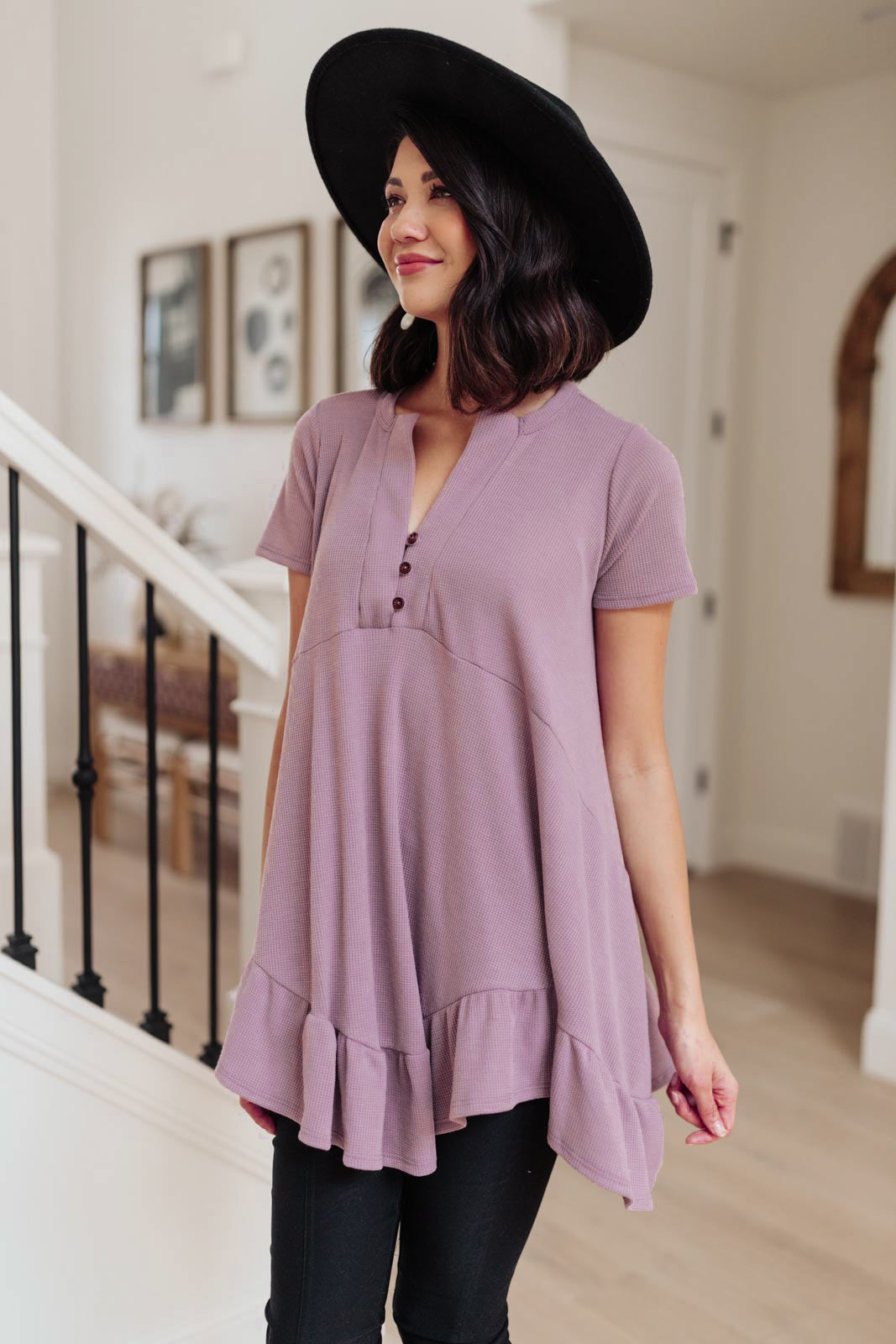 Lavender Sweet Breeze Tunic Dress featuring a button-up v neckline and ruffled hem, made from soft waffle knit fabric.