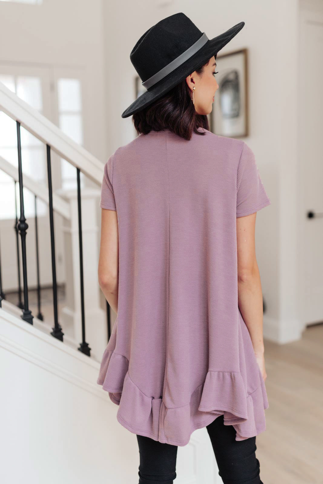 Lavender Sweet Breeze Tunic Dress featuring a button-up v neckline and ruffled hem, made from soft waffle knit fabric.