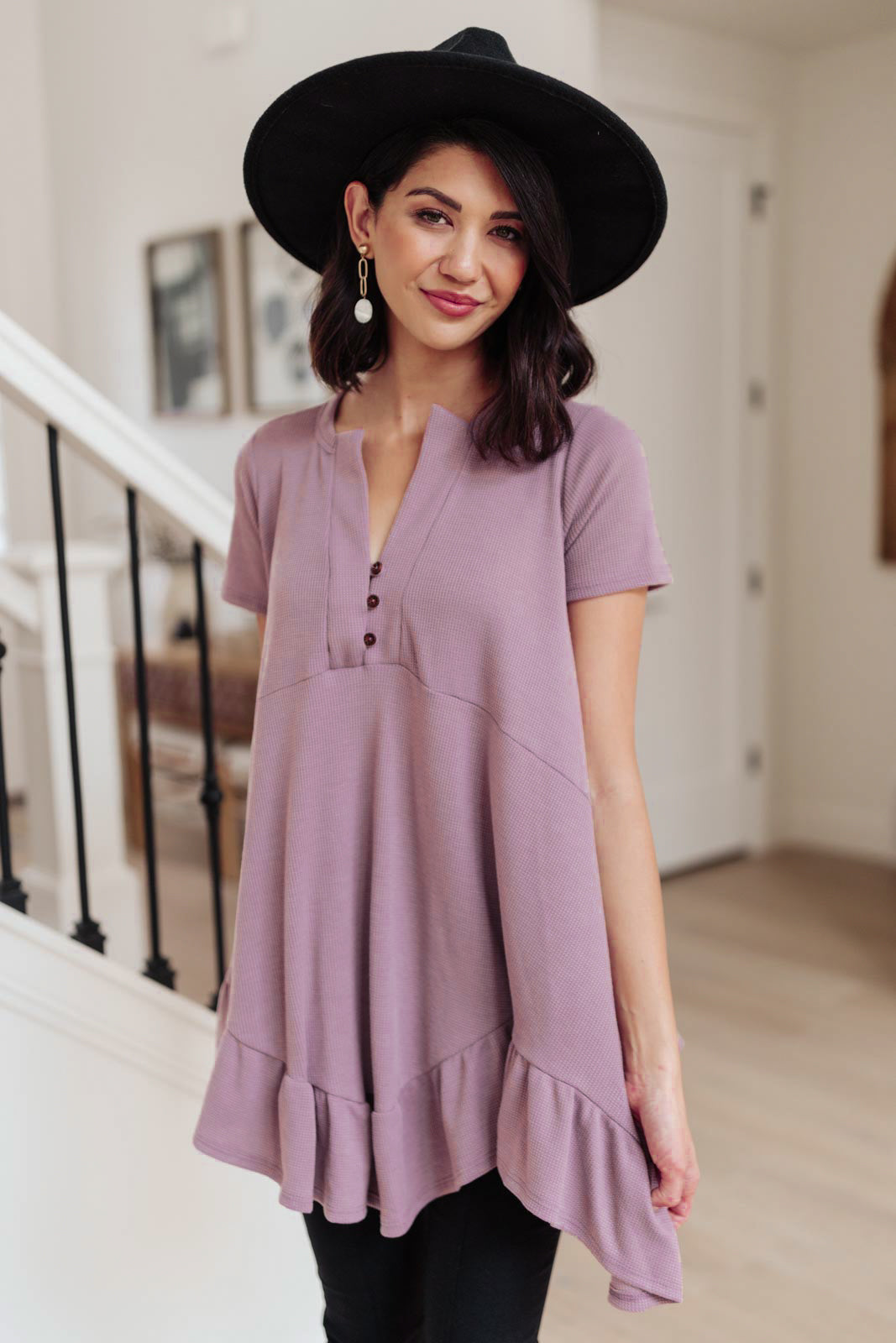 Lavender Sweet Breeze Tunic Dress featuring a button-up v neckline and ruffled hem, made from soft waffle knit fabric.