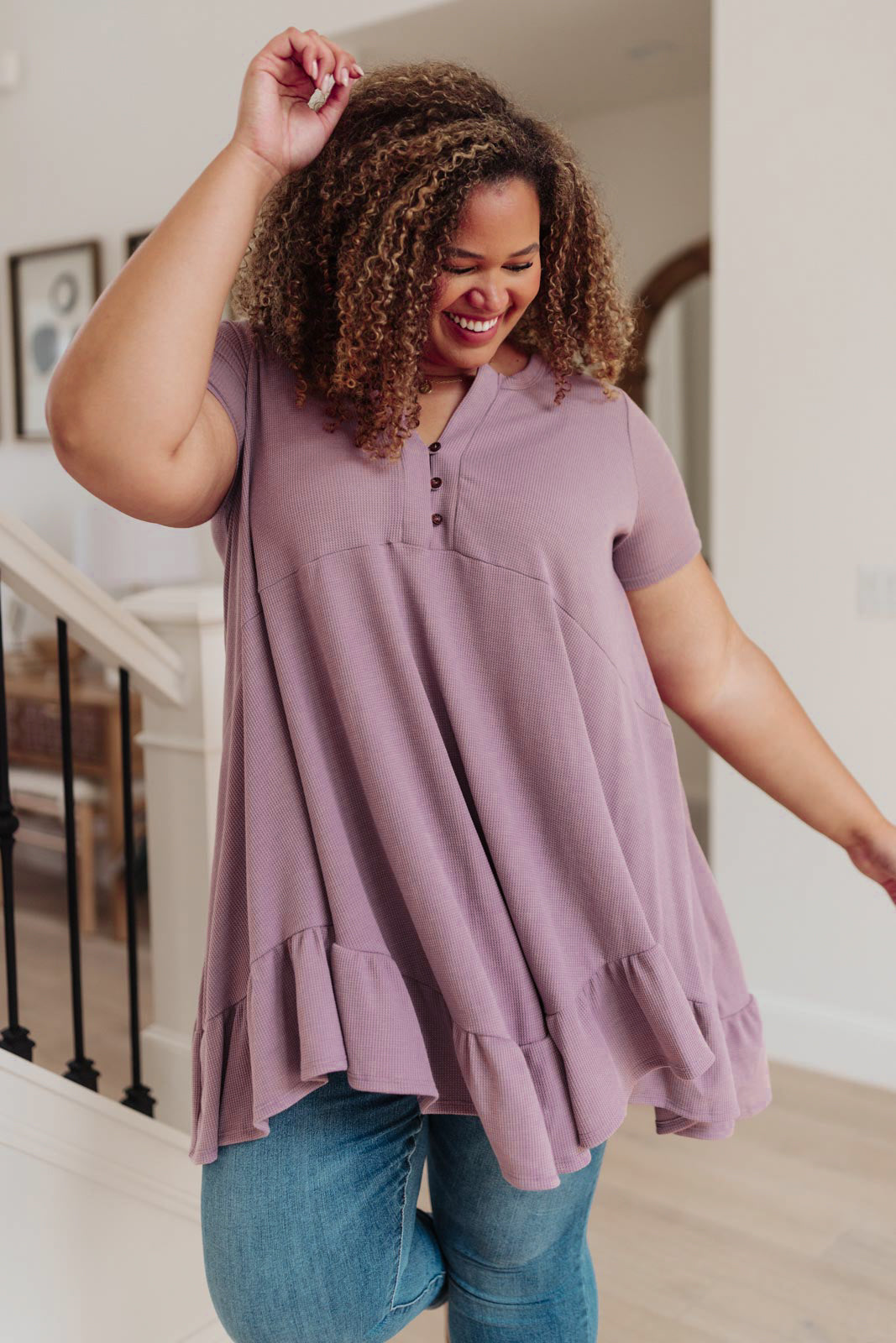 Lavender Sweet Breeze Tunic Dress featuring a button-up v neckline and ruffled hem, made from soft waffle knit fabric.