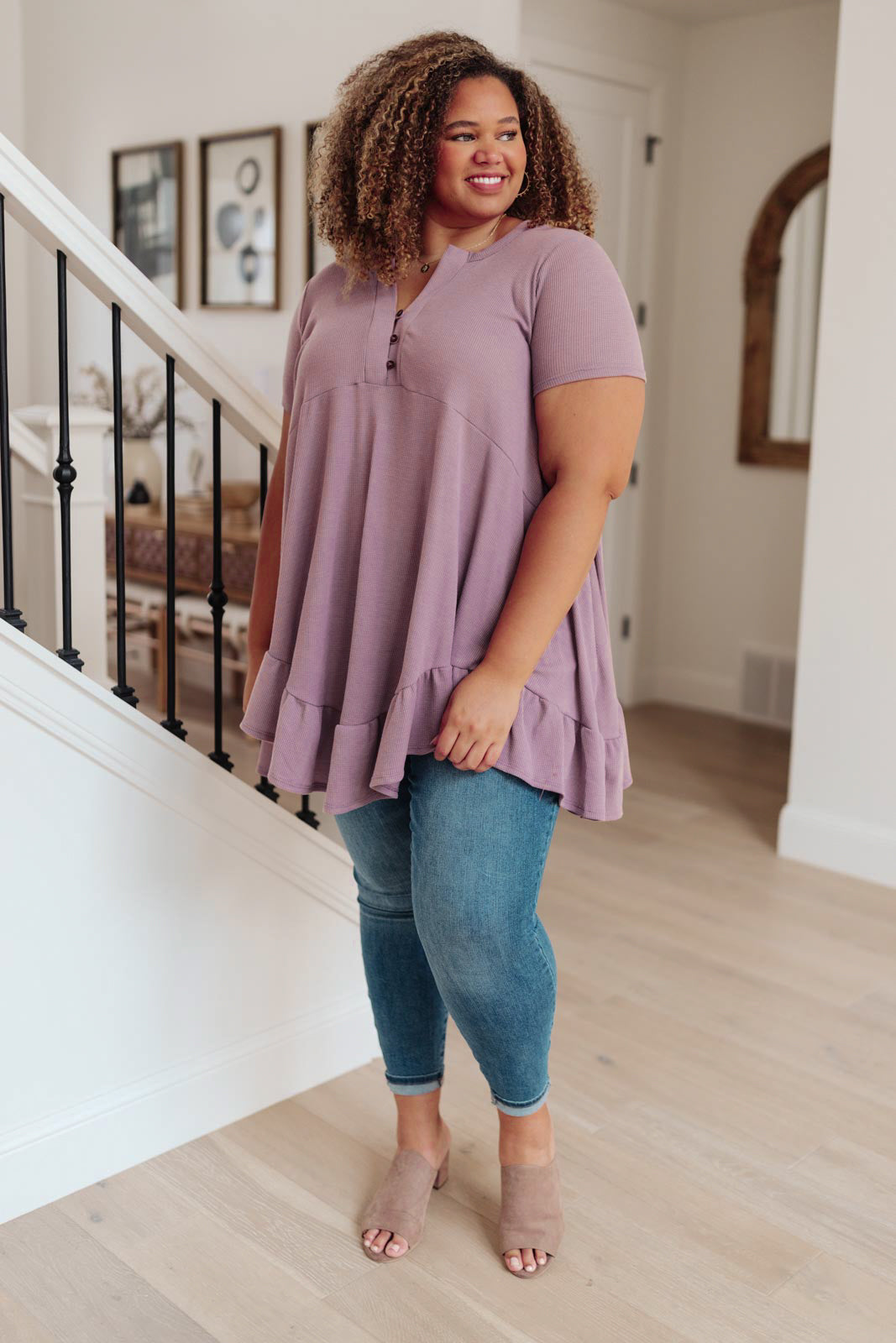 Lavender Sweet Breeze Tunic Dress featuring a button-up v neckline and ruffled hem, made from soft waffle knit fabric.